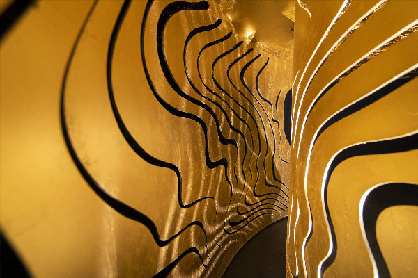 UNICA iconic piece — gold detail